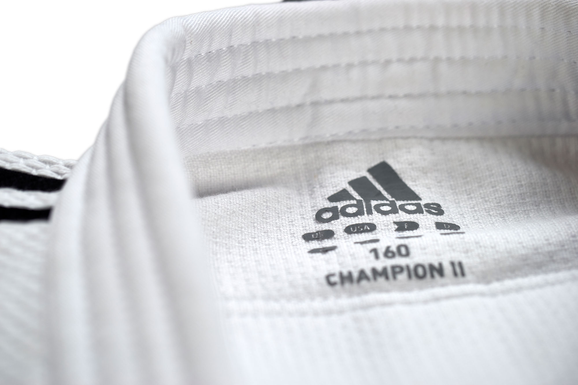 adidas Judoanzug CHAMPION II IJF, weiß/schwarze Streifen, JIJF