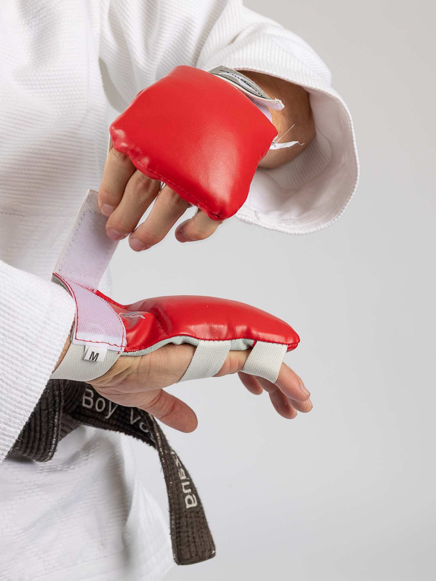 Boxhandschuh, Boxhandschuhe, Schutzhandschuh, roter Handschuh, Schlaghandschuh
