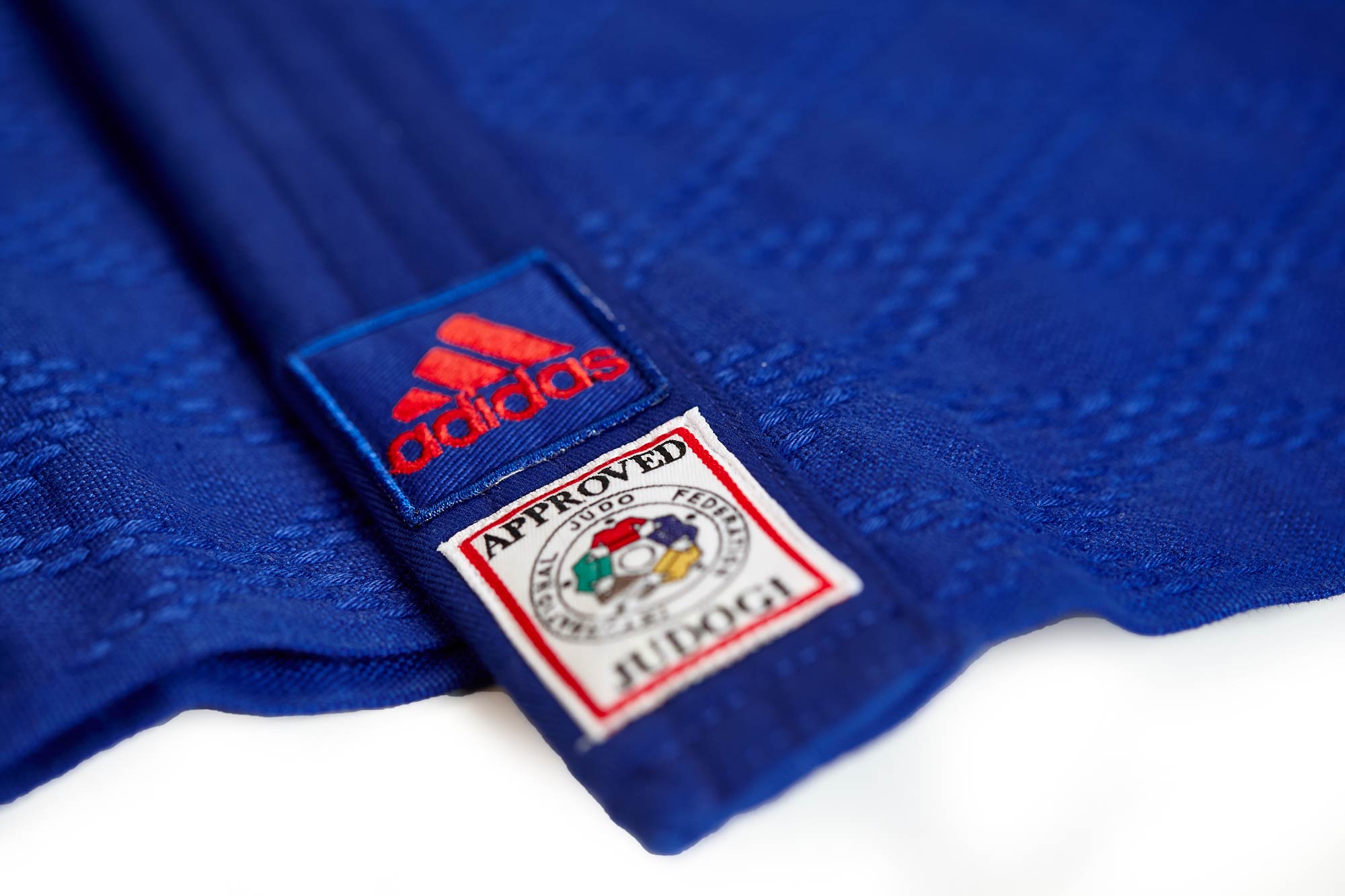 adidas Judoanzug CHAMPION II IJF, blau/rotes Logo, JIJF